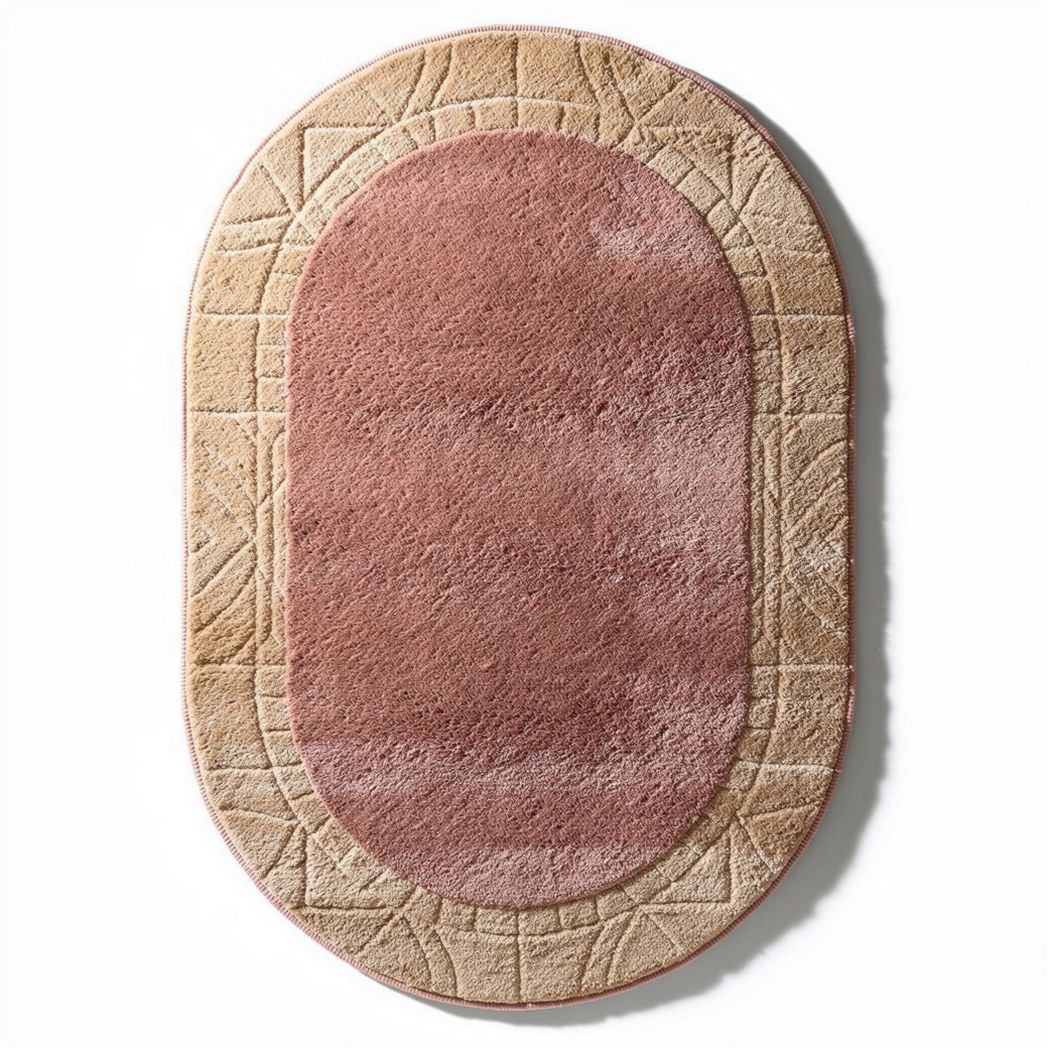 Oval area rug with textured pattern in pink and beige 100 x 60 x 2cm